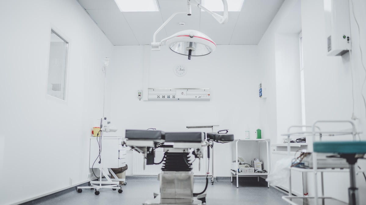 Doctor consulting a patient in a hospital room